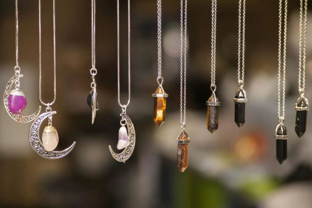 https://www.allcrystal.com/wp-content/uploads/2022/08/necklaces-with-colored-stones-x-no-credit-needed.webp