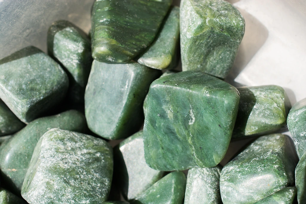 i have a feeling that these are all fake crystals, they are all bought from  the same online store. 1st is supposed to be nephrite jade, 2nd is supposed  to be malachite