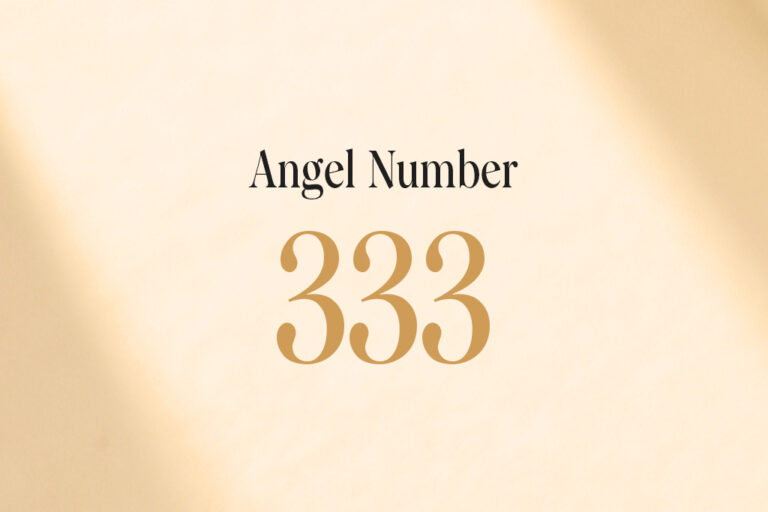 angel number 333 written on a beige background