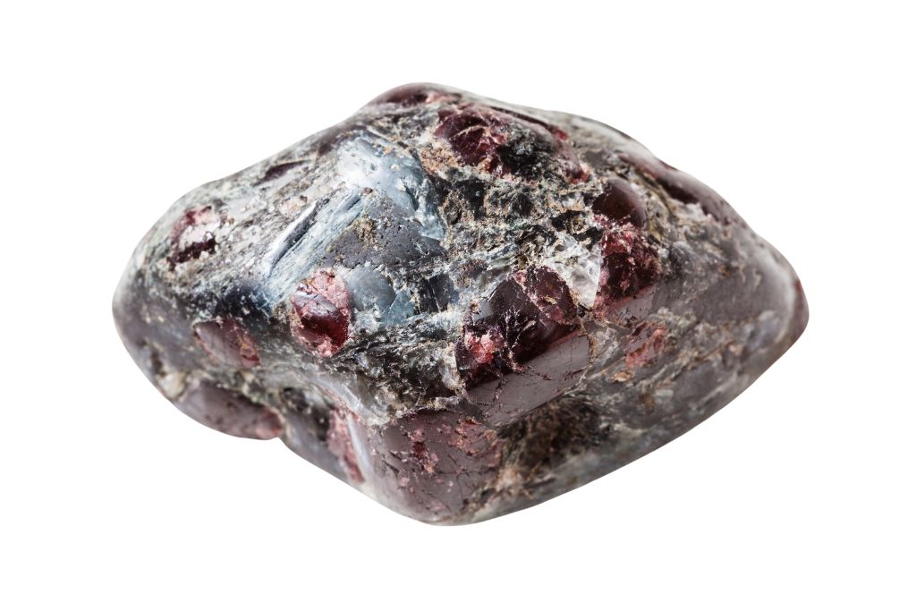 Red Almandine Garnets with a white background